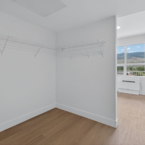 Rooftop patio at Kelowna apartments 285 Dougall Rd with seating and city views