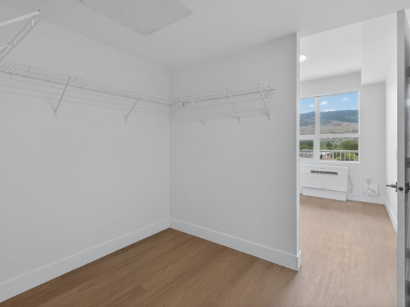 Rooftop patio at Kelowna apartments 285 Dougall Rd with seating and city views