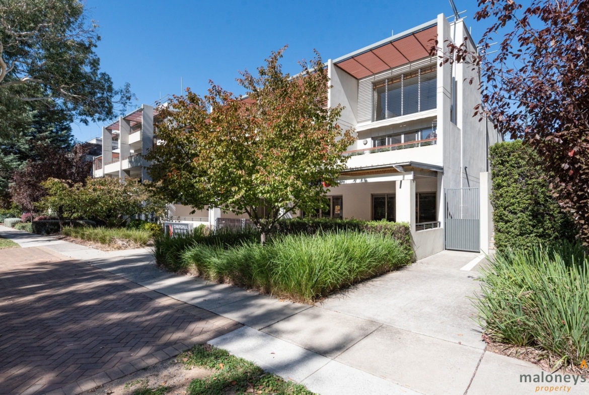 Modern two-bedroom Barton apartment for rent in Australia with spacious living and balcony.