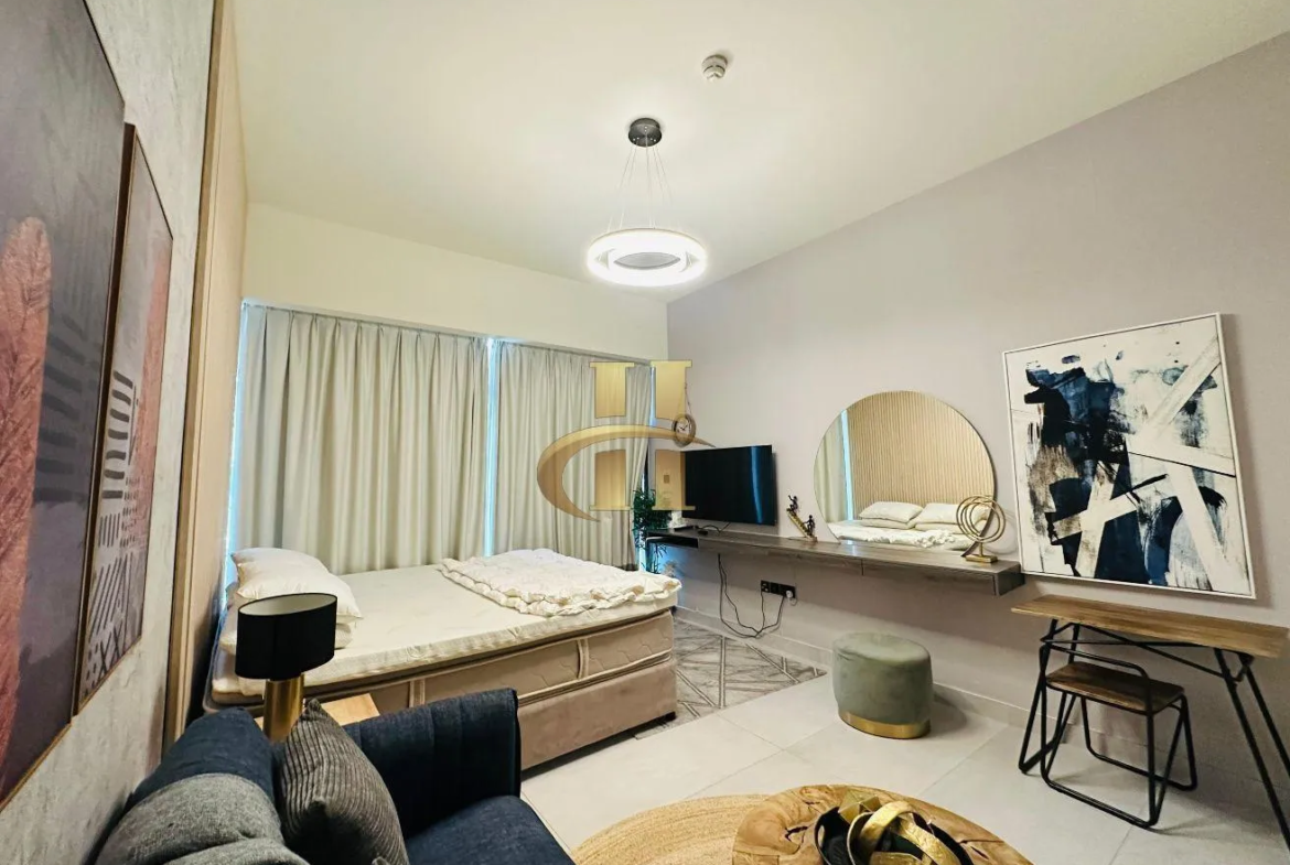 Best Oxford Boulevard studio apartment for rent in JVC Dubai with pool, gym, and parking